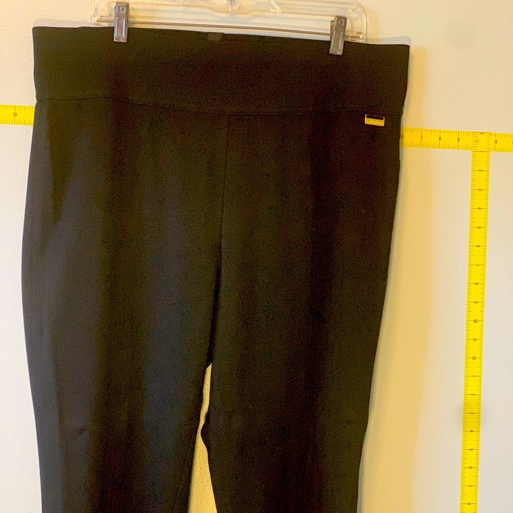 Black Calvin Klein power stretch knit straight-leg pants with elastic band waist